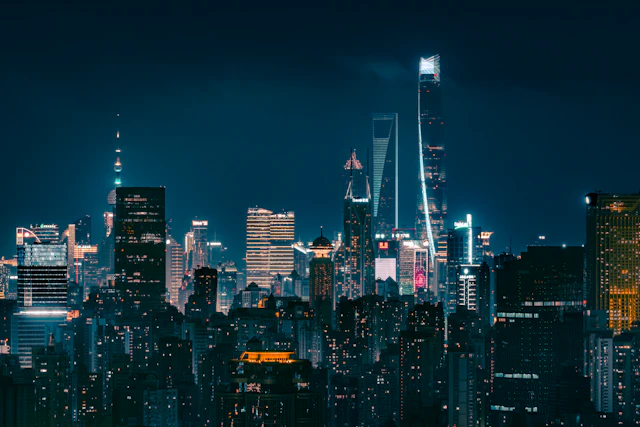 Illuminated financial district skyline at night